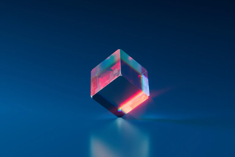 Glass cube on blue background.