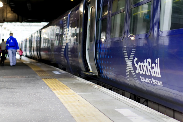 scotrail train sitting at the platform