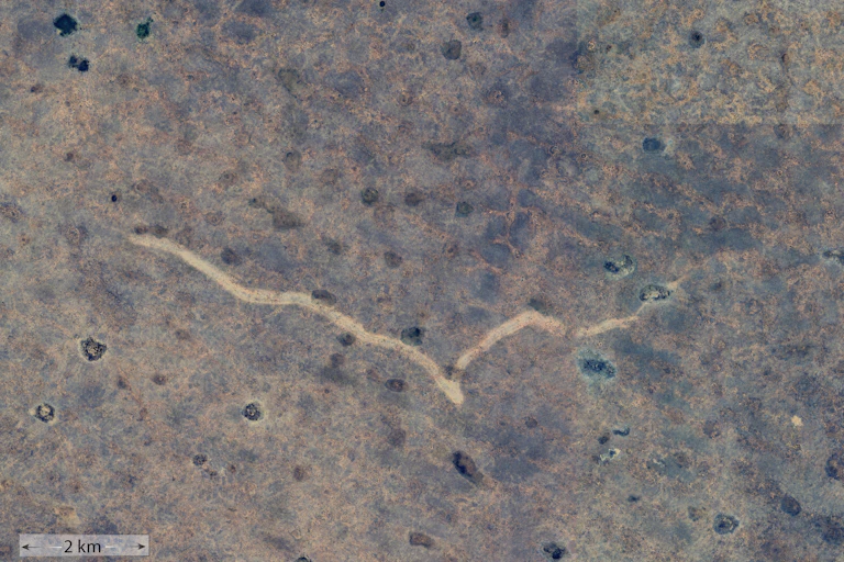 wriggling line across landscape