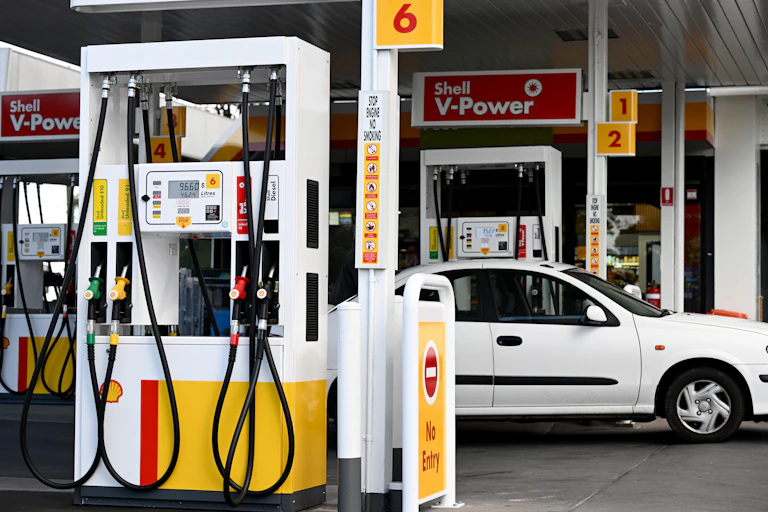 Car parked beside petrol bowser