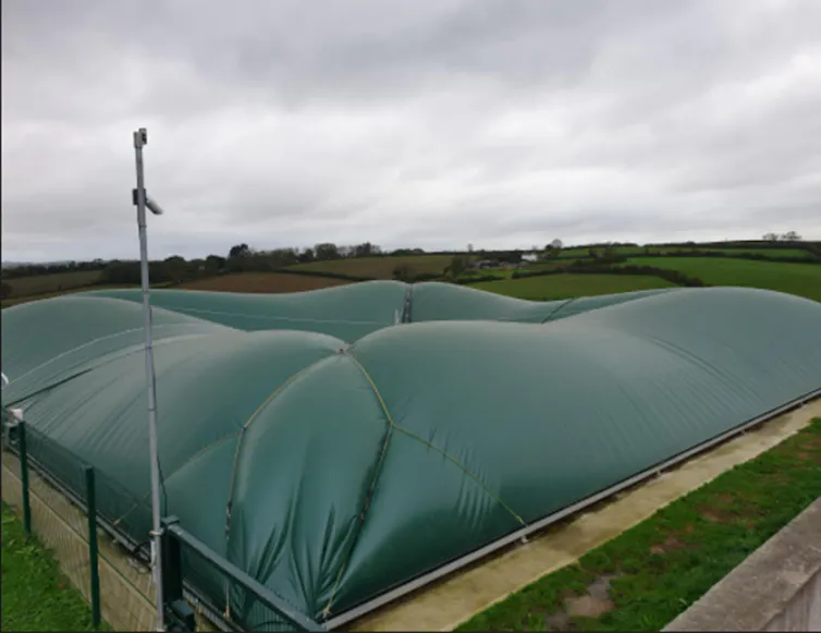 farmland with covered slurry container