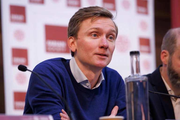 Labour MP Torsten Bell speaking at a panel event