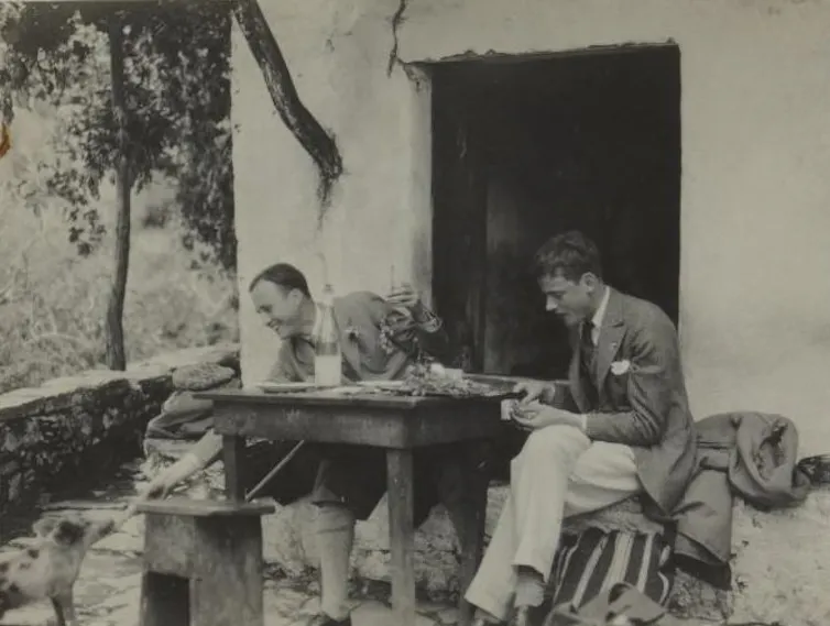 Black and white photo of two men in China