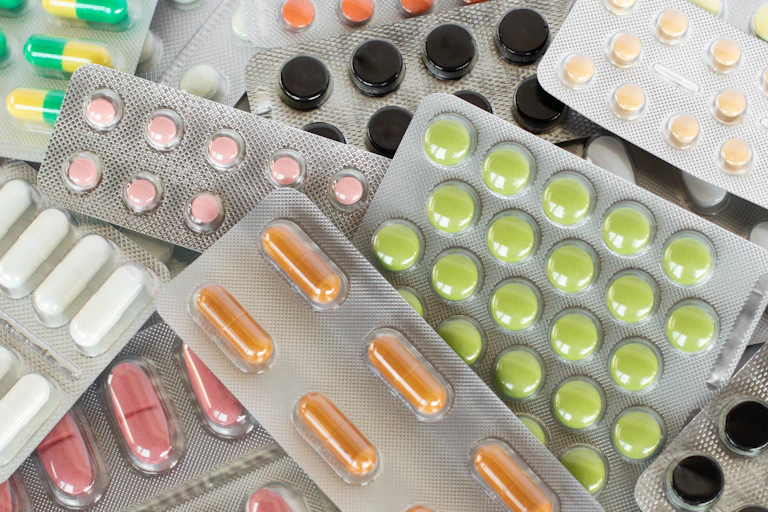 an array of colourful medicine in packets