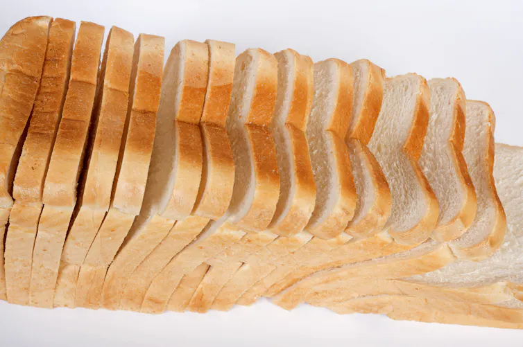 A loaf of sliced white bread.