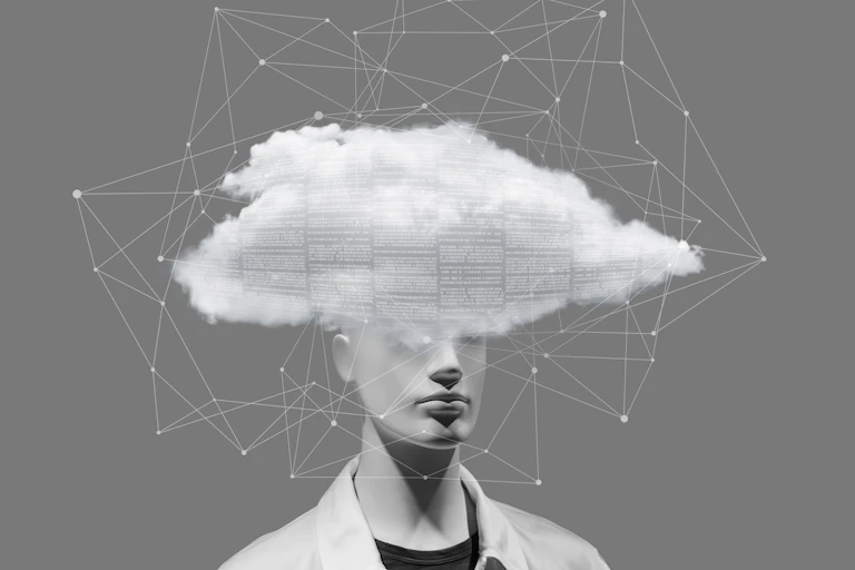 Manikin with an intelligence cloud obscuring their head