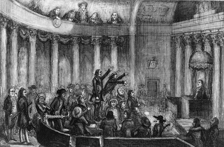 Legislators argue in the chamber of the House of Representatives.