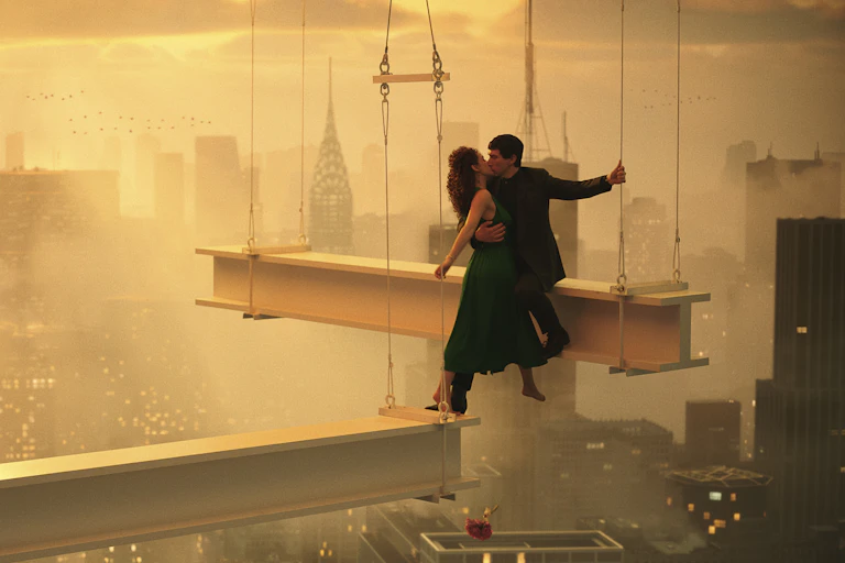 Nathalie Emmanuel and Adam Driver on a crane above a city