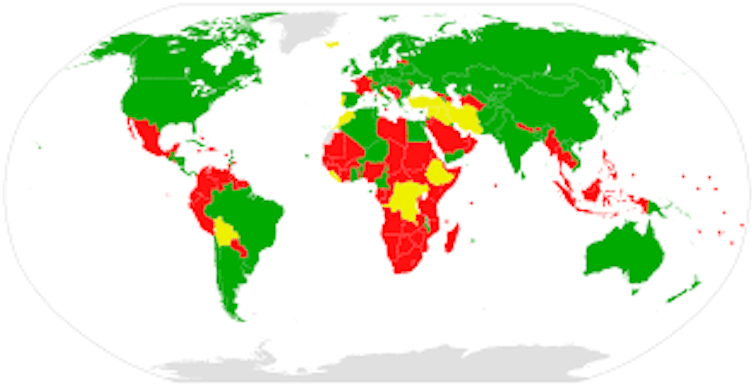 Une carte du monde coloriée en rouge, jaune et vert