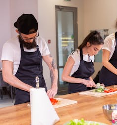 There’s a renewed push to scrap junior rates of pay for young adults. Do we need to rethink what’s fair? 1 Cooking course where a senior male chef in uniform teaches young people to slice vegetables