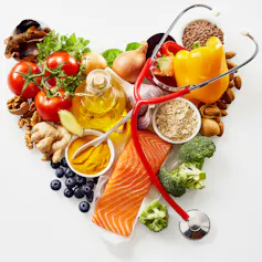 Heart-healthy foods and a stethoscope