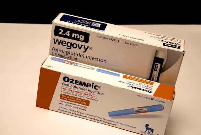 Two boxes of weight loss drugs sit on a white background.