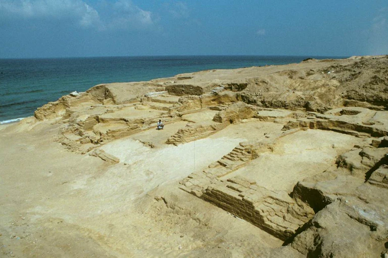 Photograph of an archaeological site next to the sea
