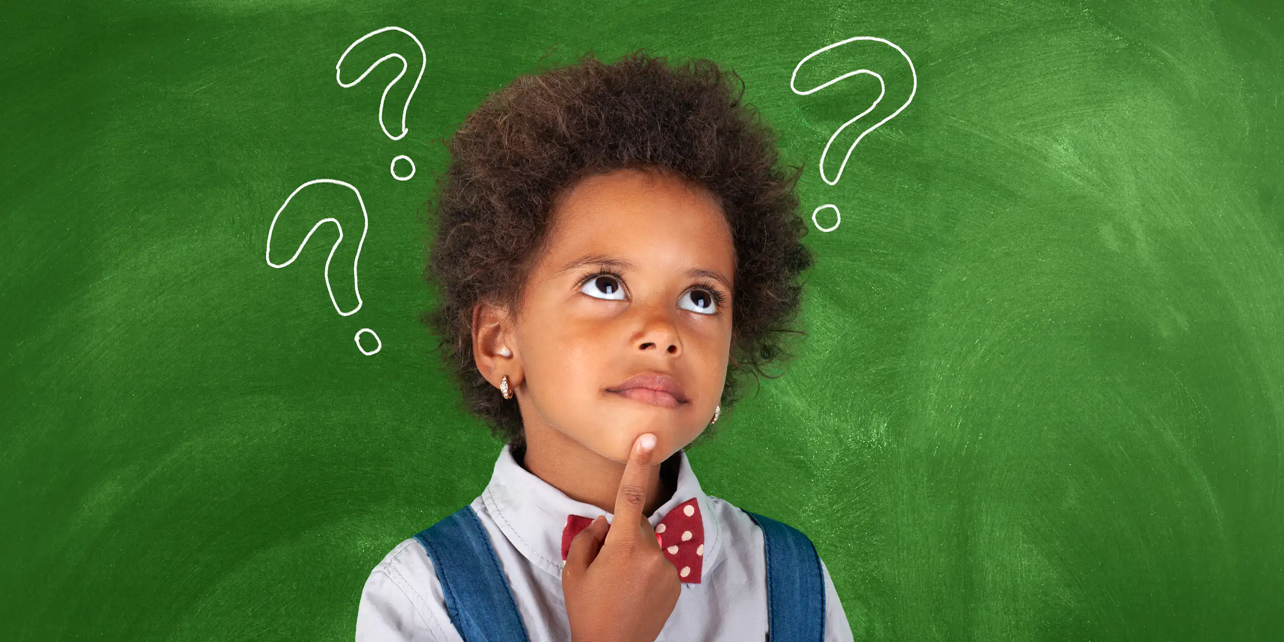 A child stands in front of a green chalkboard, one finger on their chin, comic-style question marks popping out of their head