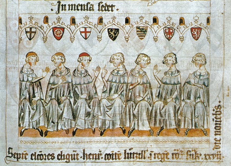 A depiction of seven dignitaries.