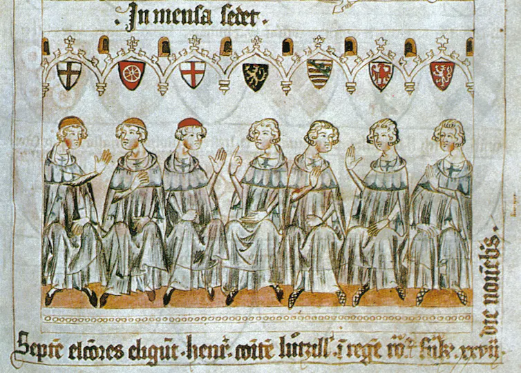 A depiction of seven dignitaries.