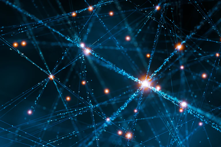 An illustration of bright dots connected together by lines.