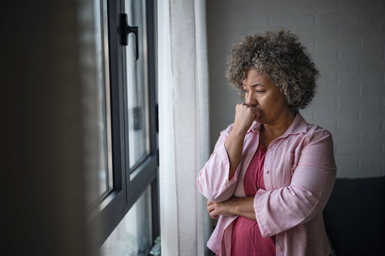 Older woman looking sad