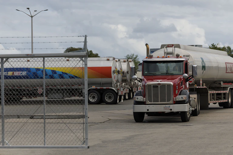 Fuel delivery truck leaving a storage depot.