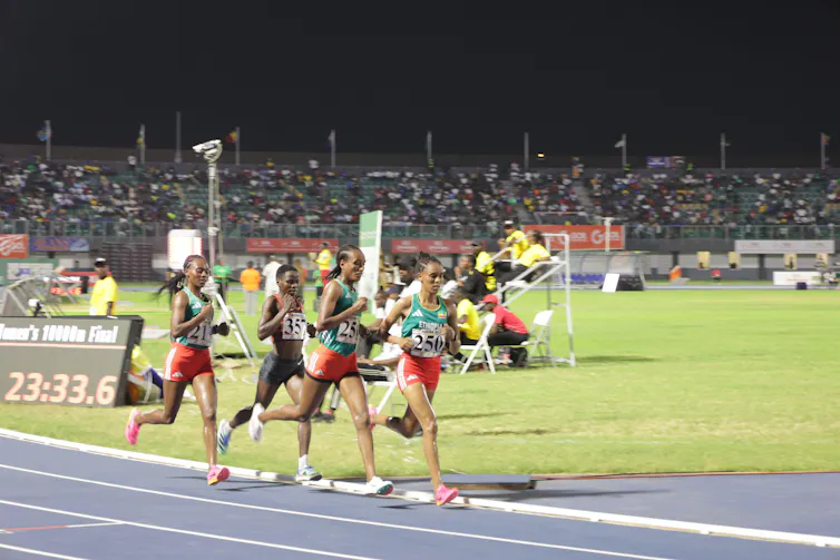 female runners compete in the 10,000m at the African Games in Accra, Ghana.