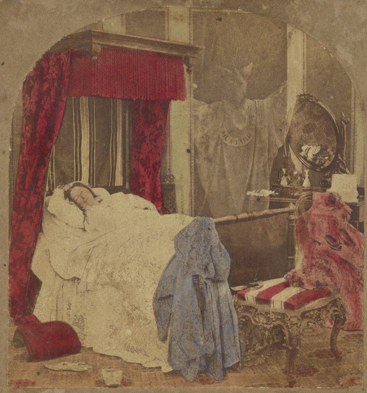 A sleeping woman in a sumptuous bed is visited by a cow-headed ghost hovering behind her.