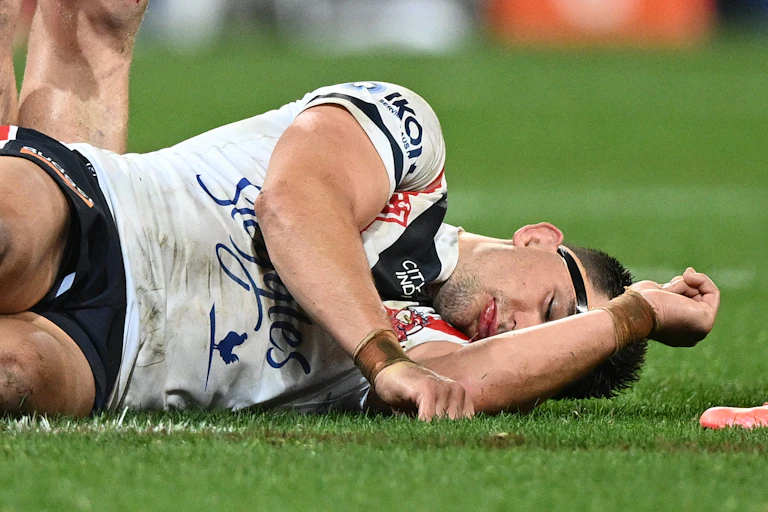 An NRL player lays injured during a 2022 clash