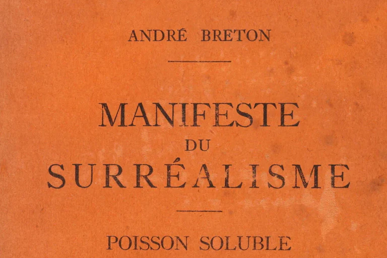 Orange title page of Andre Breton's Manifesto of Surrealism.