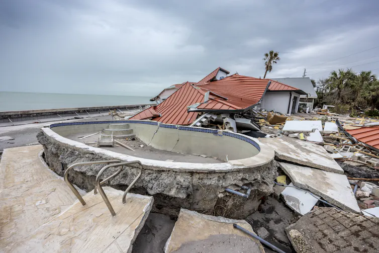 A seaside house that has been destroyed by a hurricane.