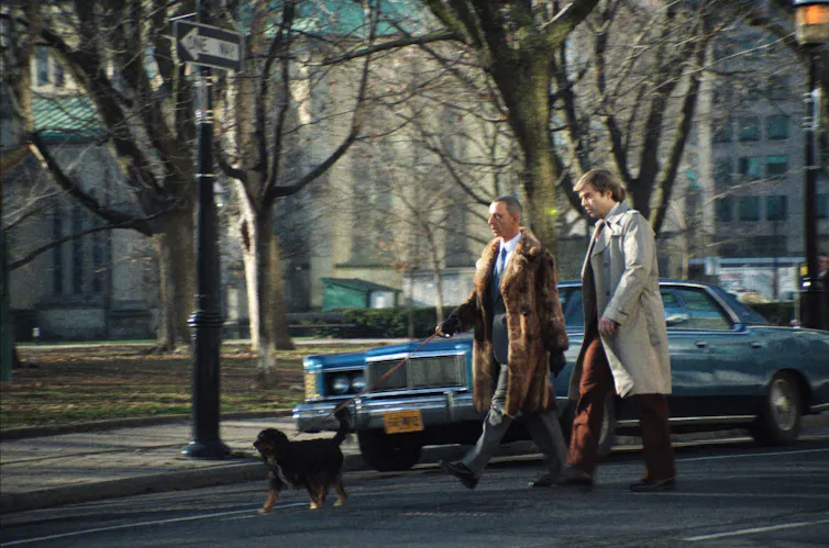 Jeremy Strong and Sebastian Stan walking a dog in New York