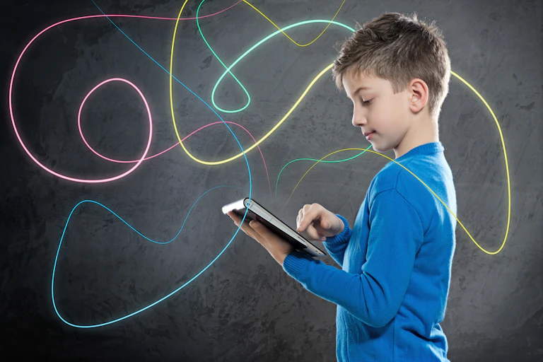 Young boy doing great things with a tablet