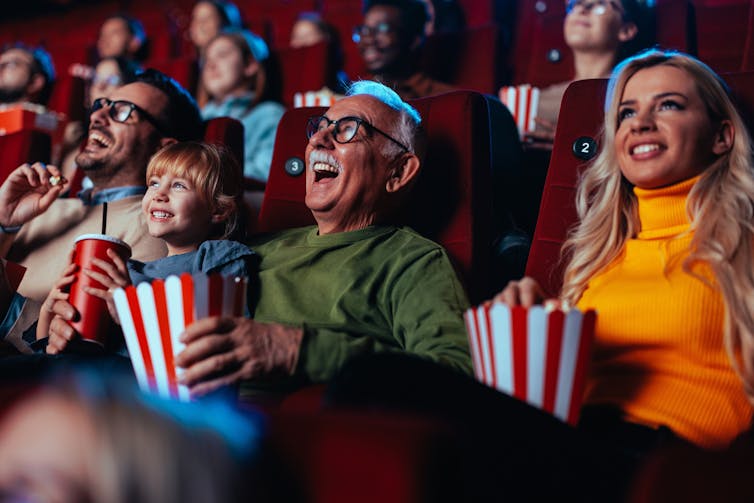 Old man in a cinema.