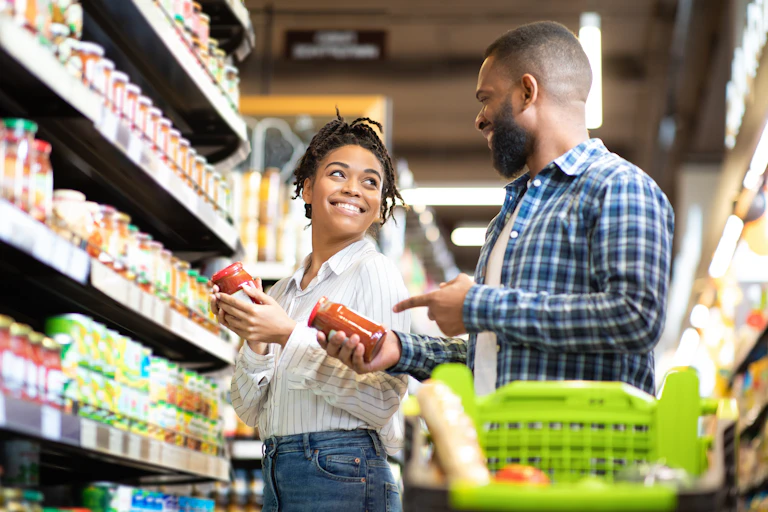 Couple shopping in supermarket.
