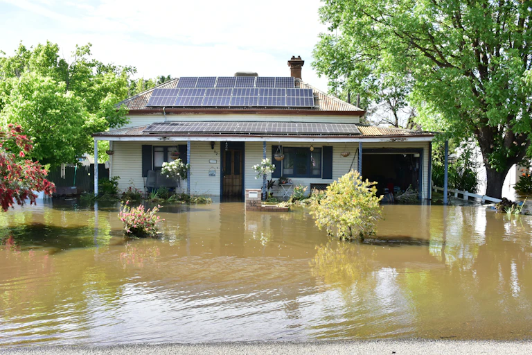A flooded house in Forbes after the 2022 floods