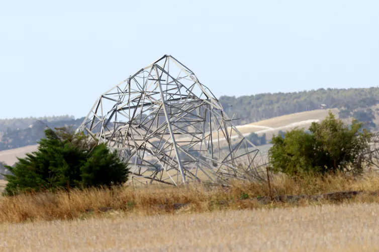broken transmission tower, storm