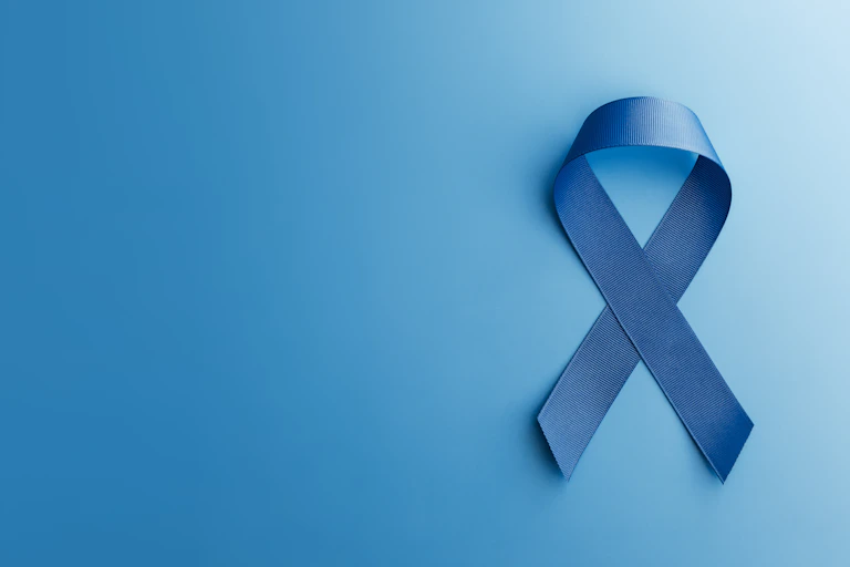 Blue ribbon with the ends crossed over
