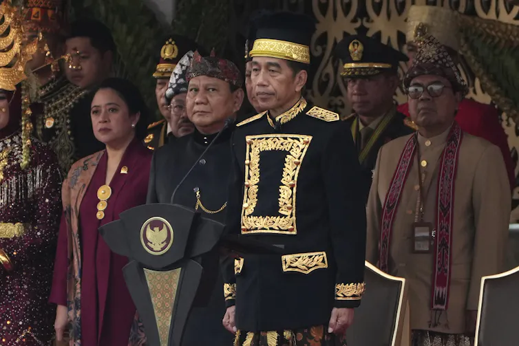 Joko Widodo and Prabowo Subianto at a ceremony.