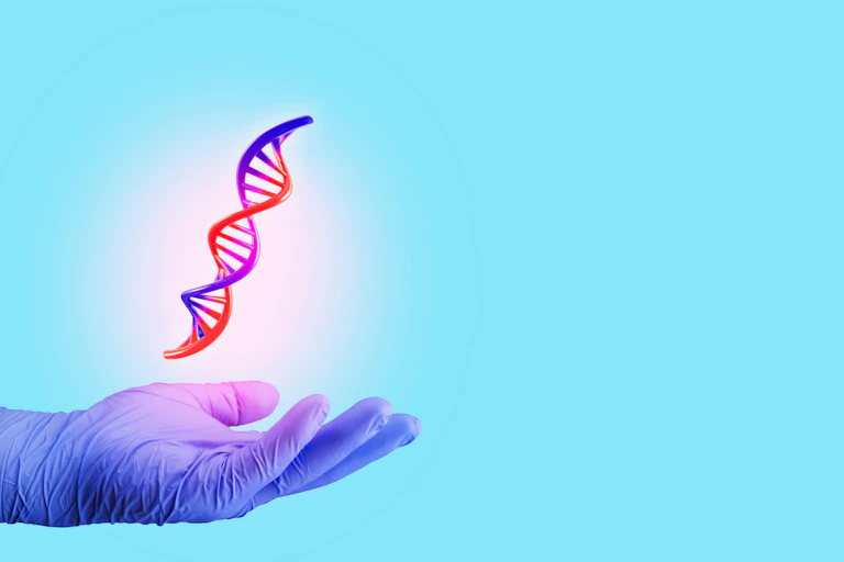 DNA strand hovering above a gloved hand