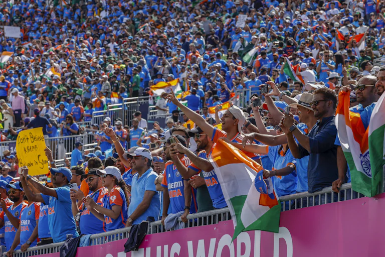 India fans cheer on their team against Pakistan in 2024