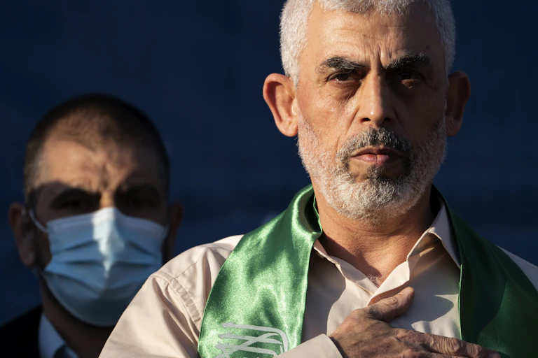 Sinwar wearing Hamas scarf