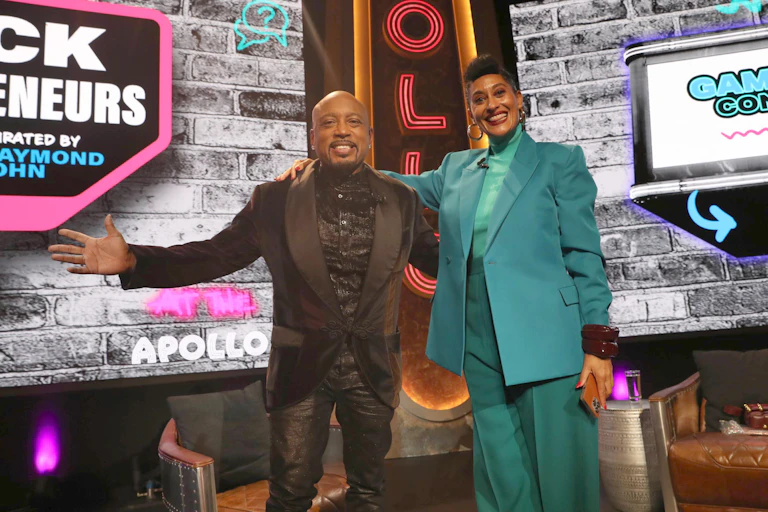 Black entrepreneurs appear on stage at the Apollo Theater.