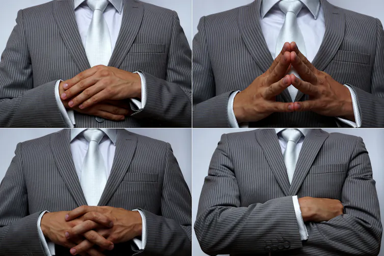 four human torsos with hands in different positions