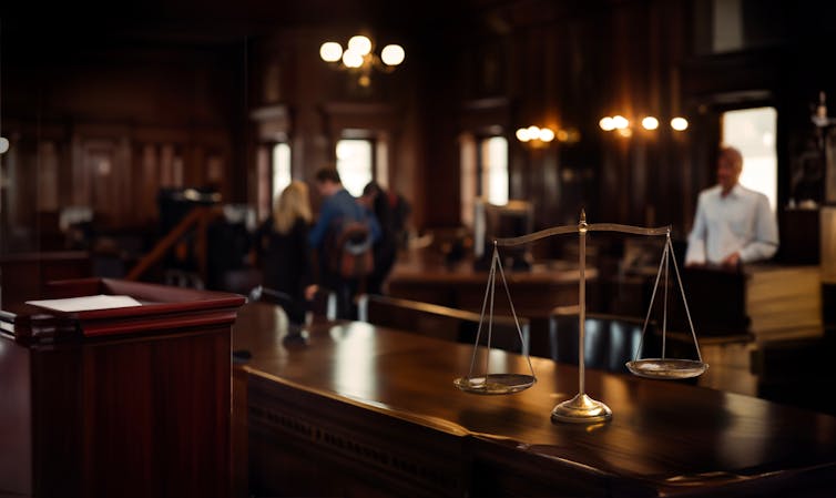 scale on judge's desk in a courtroom