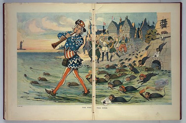 An Uncle Sam figure playing a pipe leads rats with human faces into the ocean, away from Europe's shores.