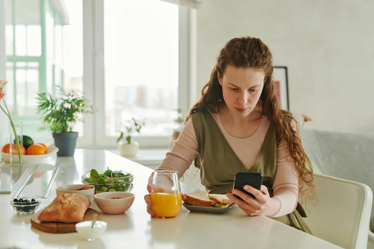 Woman drinks orange juice