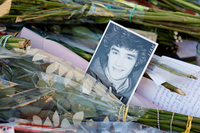 Flowers and a black and white photo of Payne