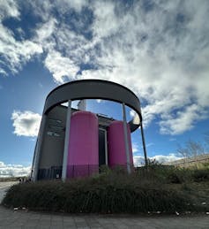 How mine water may heat up the United Kingdom’s forgotten coal cities 1 huge pink factory containers holding mine water
