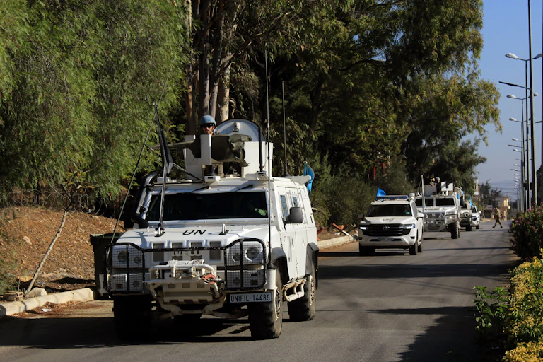 UN trucks in convoy on a road in southern Lebanon October 2024.