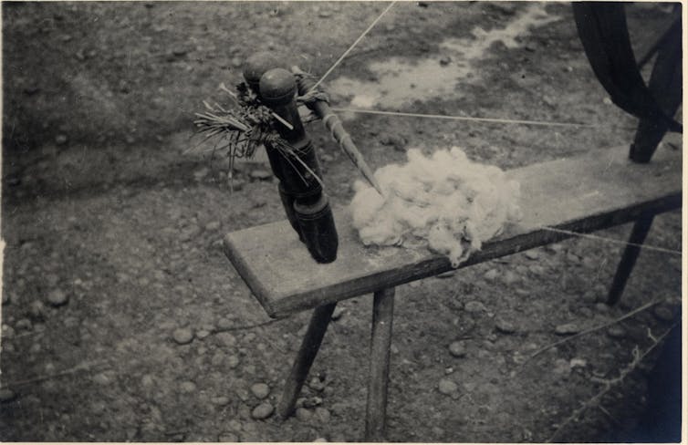Wool on the platform of a spinning wheel.
