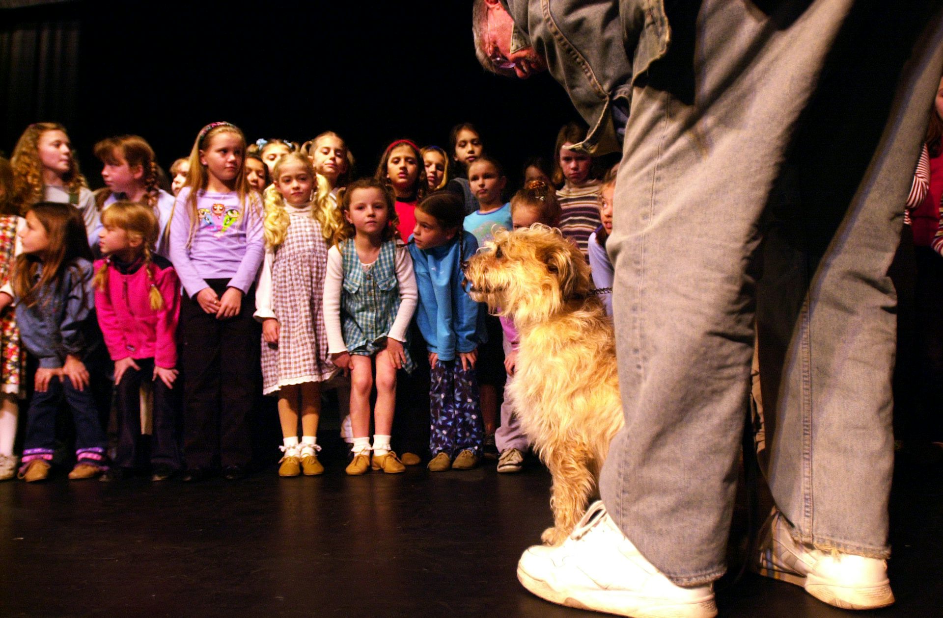 Young girls and a dog.