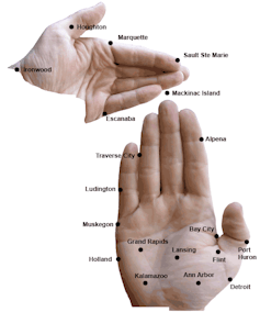 Image of two hands with various cities in Michigan mapped out on top